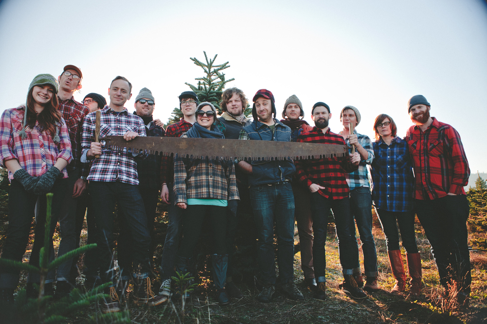 The Marmoset Family  [from left to right]: Kat Olsen, Ron Lewis, Justin DeMers, Bob Werner, Ryan Wines, Tyler Nordby, Sarah Buchanan, Eric Nordby, Stirling Myles, Jon Haas, Rob Dennler, Shane Geiger, Amy Hall, Brian Hall.&nbsp;[Brandon Day not pictured]